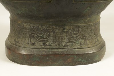 Lot 218 - A LARGE CHINESE MING DYNASTY SQUARE SECTION TWO-HANDLED BRONZE BALUSTER VASE