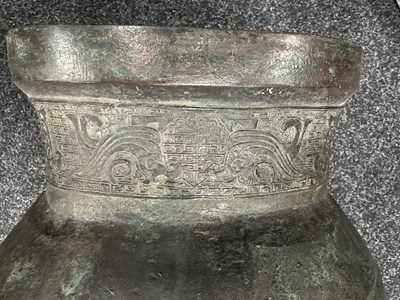 Lot 218 - A LARGE CHINESE MING DYNASTY SQUARE SECTION TWO-HANDLED BRONZE BALUSTER VASE