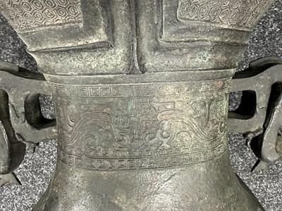 Lot 218 - A LARGE CHINESE MING DYNASTY SQUARE SECTION TWO-HANDLED BRONZE BALUSTER VASE
