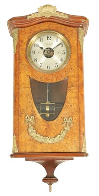 Lot 973 - A FRENCH ORMOLU MOUNTED BURR ELM BULLE ELECTRIC WALL CLOCK