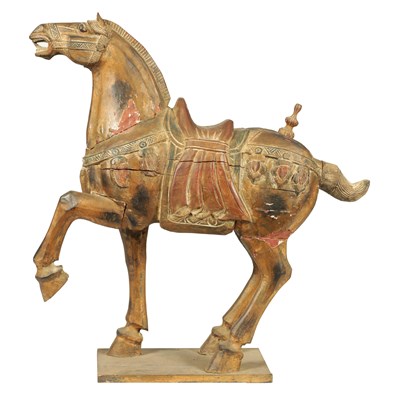 Lot 168 - A MID 19TH CENTURY CHINESE TANG DYNASTY STYLE POLYCHROME DECORATED CARVED SCULPTURE OF A HORSE