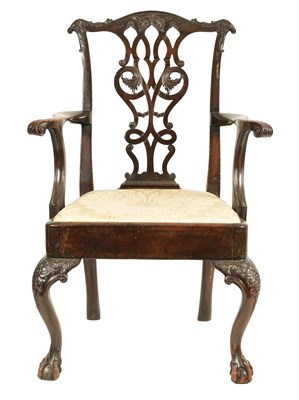 Lot 1150 - A GEORGE III CARVED MAHOGANY CHIPPENDALE STYLE OPEN ARMCHAIR