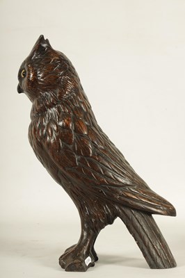 Lot 758 - A LATE 19TH CENTURY LIFE SIZE COLD PAINTED CAST IRON OWL