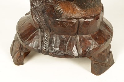 Lot 565 - A 19TH CENTURY LINDEN WOOD BLACK FOREST CARVED BEAR JARDINIERE STAND