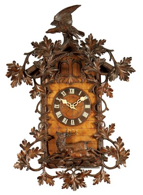 Lot 992 - A LARGE 19TH CENTURY THREE-TRAIN MUSICAL CUCKOO CLOCK