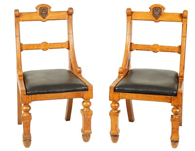 Lot 1184 - A PAIR OF LATE 19TH CENTURY GOTHIC REVIVAL OAK HALL CHAIRS