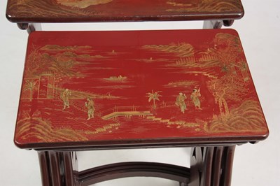 Lot 102 - A SET OF 19TH CENTURY SCARLET LACQUER CHINOISERIE DECORATED NEST OF TABLES
