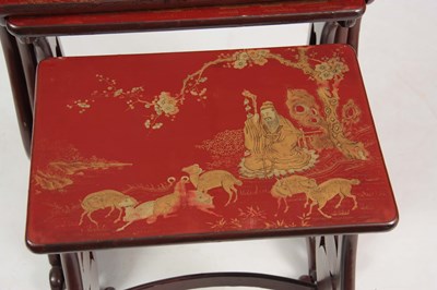 Lot 102 - A SET OF 19TH CENTURY SCARLET LACQUER CHINOISERIE DECORATED NEST OF TABLES