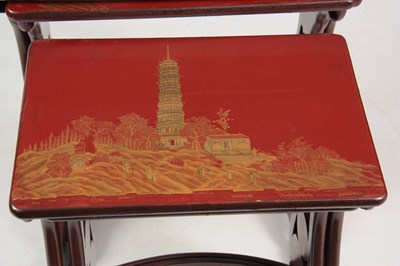 Lot 102 - A SET OF 19TH CENTURY SCARLET LACQUER CHINOISERIE DECORATED NEST OF TABLES