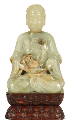 Lot 119 - A 17TH/18TH CENTURY CHINESE JADE FIGURE OF BUDDHA ON LATER BASE