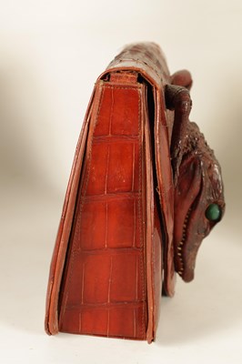 Lot 660 - A VINTAGE STITCHED CREAM CROCODILE SKIN SMALL SUITE CASE