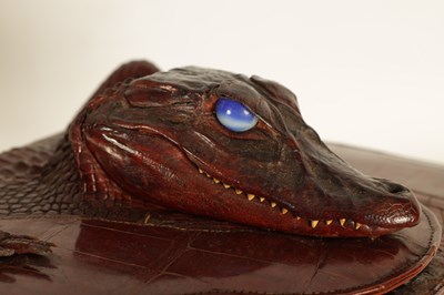 Lot 660 - A VINTAGE STITCHED CREAM CROCODILE SKIN SMALL SUITE CASE