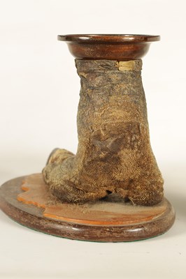 Lot 648 - AN EARLY 20TH CENTURY TAXIDERMY OSTRICH FOOT