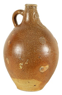 Lot 74 - A 17TH CENTURY GERMAN STONEWARE BELLARMINE