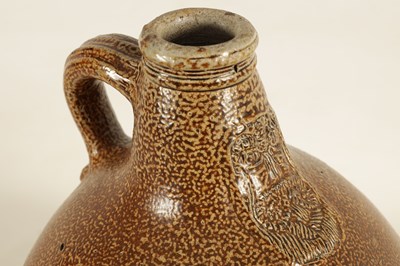 Lot 74 - A 17TH CENTURY GERMAN STONEWARE BELLARMINE