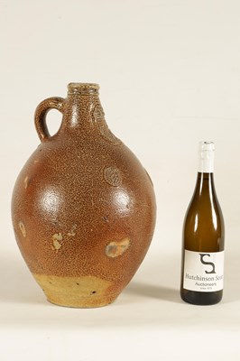 Lot 74 - A 17TH CENTURY GERMAN STONEWARE BELLARMINE