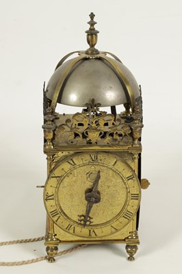 Lot 388 - A FIRST PERIOD ENGLISH BRASS LANTERN CLOCK