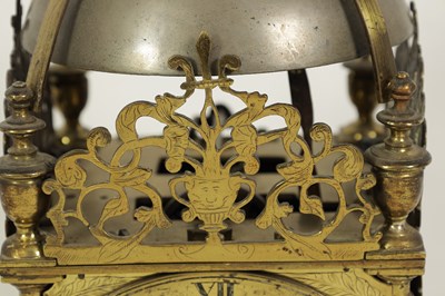 Lot 388 - A FIRST PERIOD ENGLISH BRASS LANTERN CLOCK