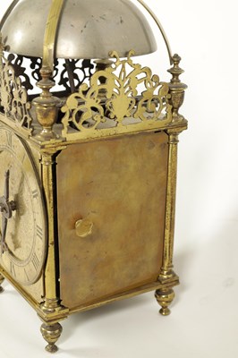 Lot 388 - A FIRST PERIOD ENGLISH BRASS LANTERN CLOCK