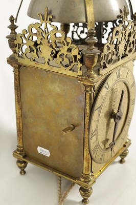 Lot 388 - A FIRST PERIOD ENGLISH BRASS LANTERN CLOCK