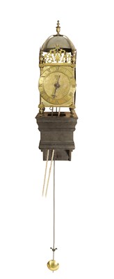 Lot 388 - A FIRST PERIOD ENGLISH BRASS LANTERN CLOCK