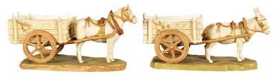 Lot 76 - A MATCHED PAIR OF ROYAL DUX PORCELAIN SCULPTURES DEPICTING A HORSE AND DONKEY PULLING CARTS