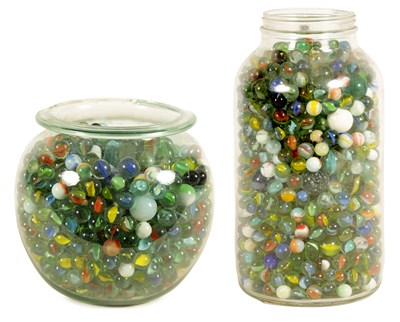 Lot 545 - TWO JARS OF GLASS MARBLES