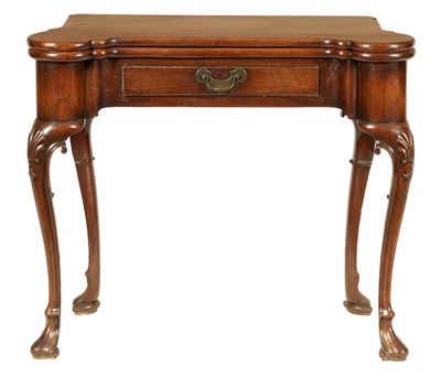 Lot 670 - A GEORGE II FIGURED MAHOGANY FOLD OVER TEA TABLE