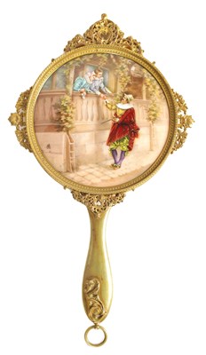 Lot 575 - A STYLISH 19TH CENTURY FRENCH LIMOGES PANELLED GILT BRASS HAND MIRROR