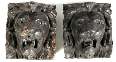 Lot 598 - A LARGE PAIR OF MID 19TH CENTURY CAST IRON LION MASKS