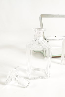 Lot 632 - A STYLISH 1930s SILVER PLATED TANTALUS WITH BACCARAT GLASS DECANTERS IN THE STYLE OF JACQUES ADNET