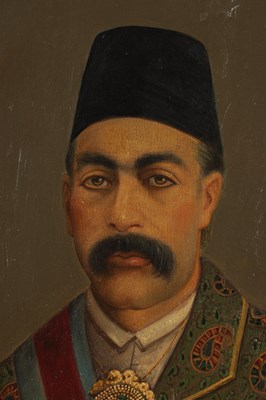 Lot 344 - A 19TH CENTURY QAJAR OIL ON CANVAS PORTRAIT OF ETEMD AL DOLEH