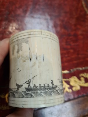 Lot 557 - A LATE 19TH CENTURY MARINE IVORY SCRIMSHAW LIDDED CONTAINER