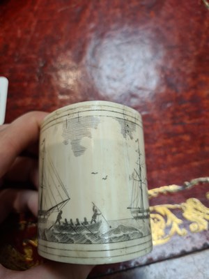 Lot 557 - A LATE 19TH CENTURY MARINE IVORY SCRIMSHAW LIDDED CONTAINER