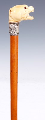 Lot 311 - A LATE 19TH CENTURY CARVED IVORY HANDLED...
