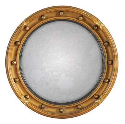 Lot 589 - A LATE 19TH CENTURY MINIATURE GILT CONVEX HANGING MIRROR