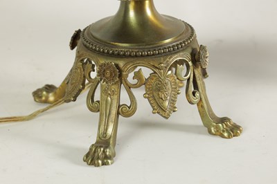 Lot 718 - A PAIR OF LATE 19TH CENTURY CAST GILT BRASS AND PORCELAIN OIL LAMPS CONVERTED FOR ELECTRICITY