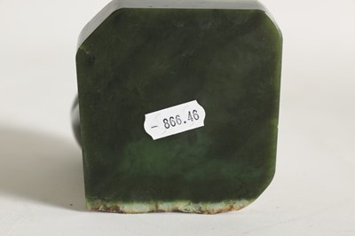 Lot 113 - AN ORIENTAL CARVED JADE SCULPTURE OF AN ESKIMO