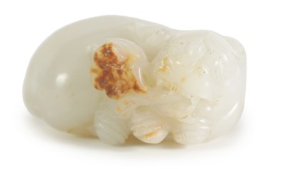 Lot 127 - A 19TH CENTURY WHITE AND RUSET JADE CARVED SCULPTURE