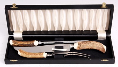 Lot 338 - A CASED SET OF STAG HORN HANDLED THREE PIECE...