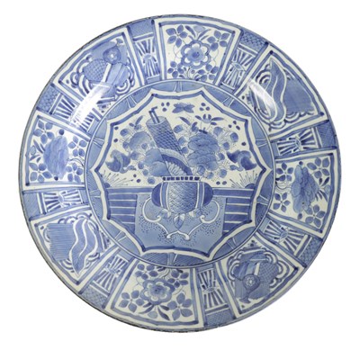 Lot 83 - A 17TH CENTURY JAPANESE BLUE AND WHITE CHARGER