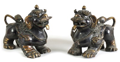 Lot 109 - A PAIR OF BRONZE CHINESE DRAGON LIONS