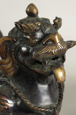 Lot 109 - A PAIR OF BRONZE CHINESE DRAGON LIONS