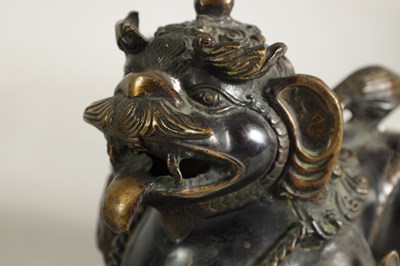 Lot 109 - A PAIR OF BRONZE CHINESE DRAGON LIONS