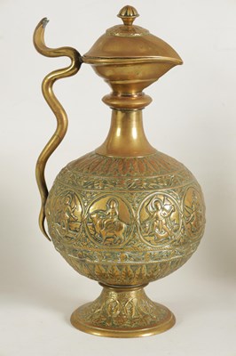 Lot 230 - A VERY LARGE BRASS EWER
