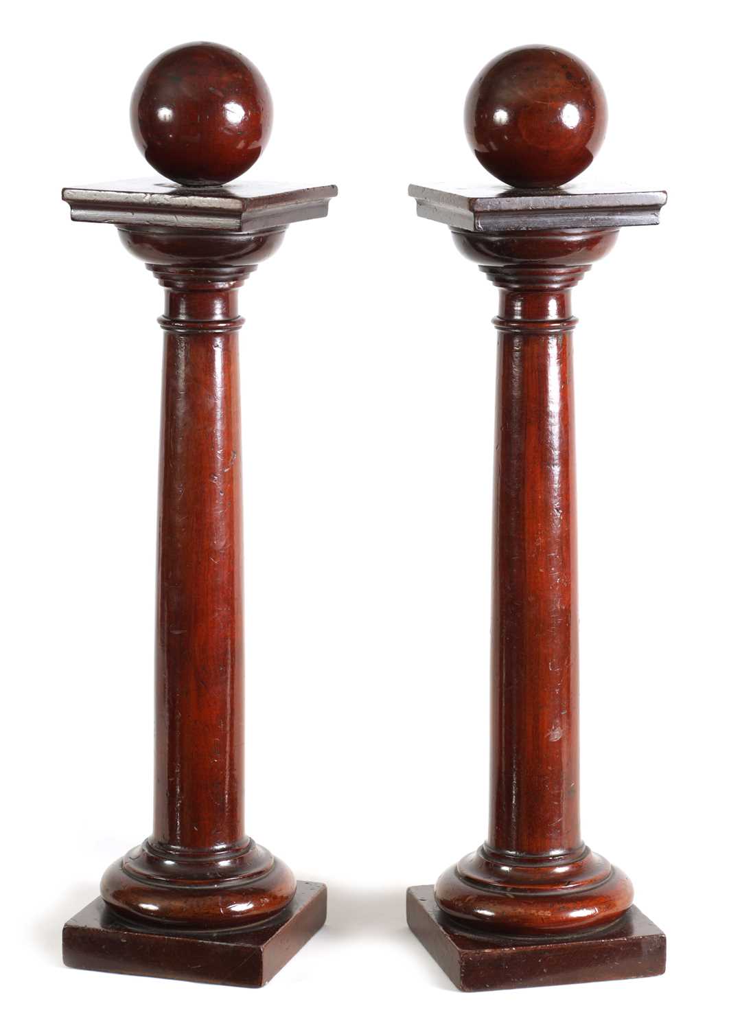 Lot 305 - A PAIR OF REGENCY TURNED MAHOGANY COLUMNS