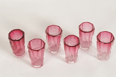 Lot 31 - AN ART NOUVEAU RUBY AND CLEAR GLASS MOSER DECANTER, TRAY AND SIX GLASSES