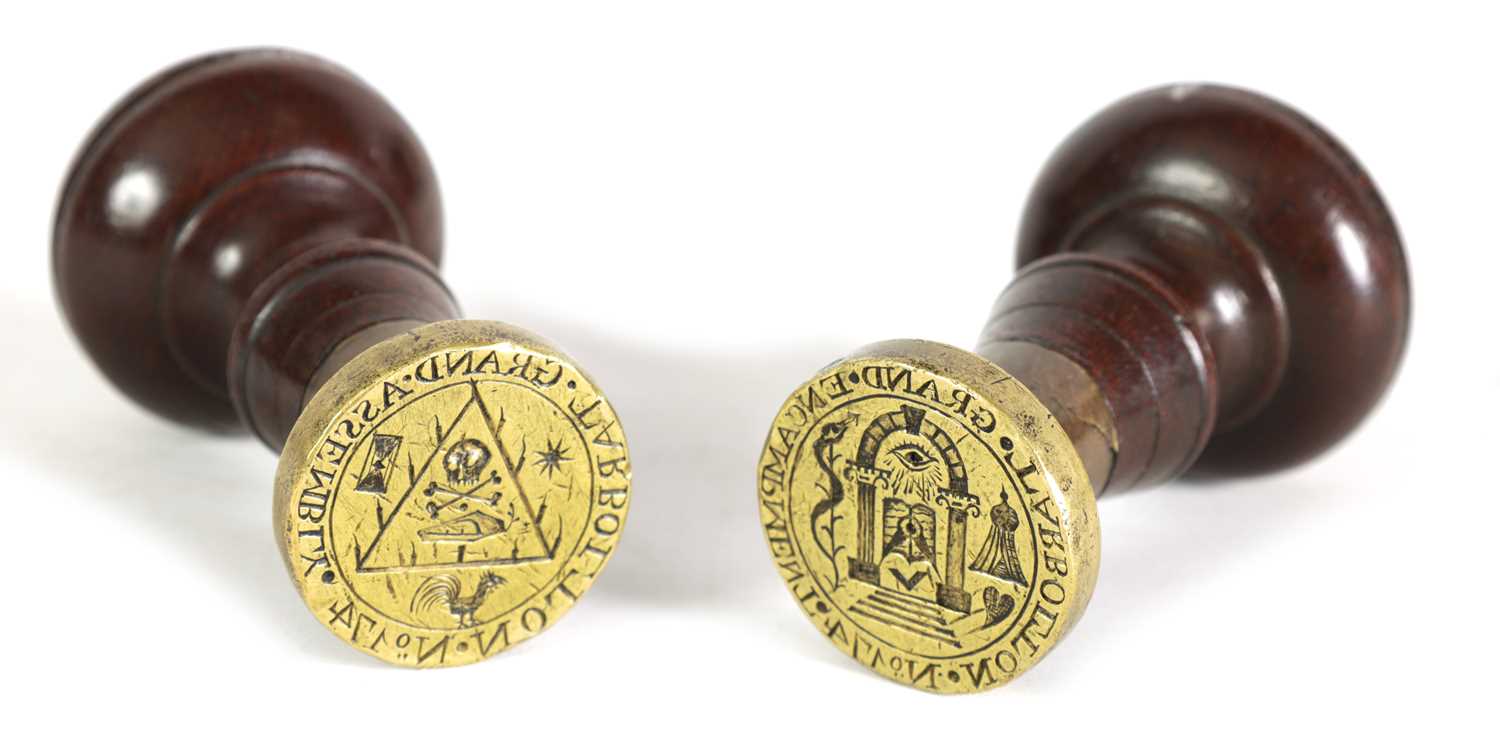 Lot 629 - A PAIR OF LATE 18TH CENTURY MASONIC BRASS AND MAHOGANY SEALS