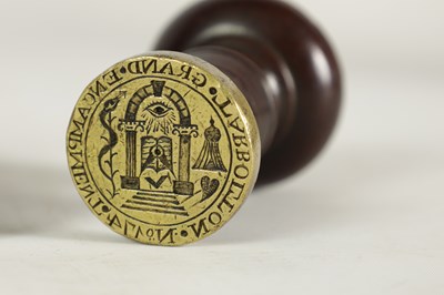 Lot 629 - A PAIR OF LATE 18TH CENTURY MASONIC BRASS AND MAHOGANY SEALS