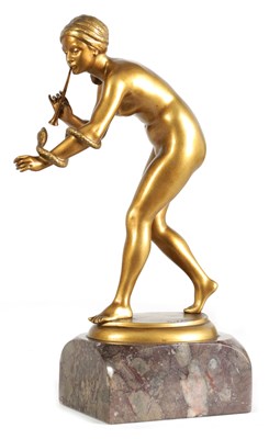 Lot 609 - RUDLOPH KAESBACH (1873 - 1955). AN ART DECO GILT BRONZE STANDING FEMALE NUDE FIGURE OF A SNAKE CHARMER